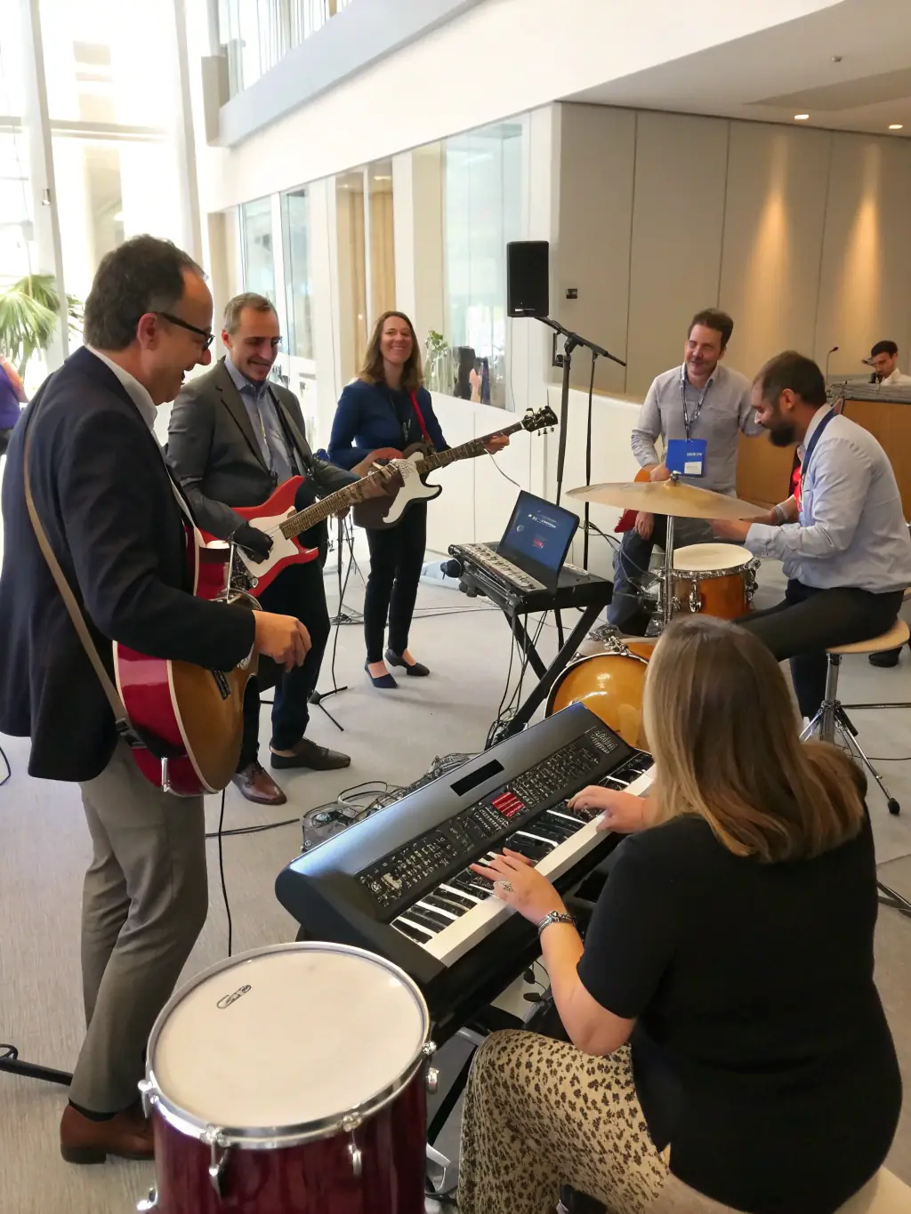 Adults learning to play instruments in a group setting, demonstrating the accessibility and enjoyment of music education at any age.